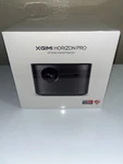 Xgimi Horizon 4K Dlp Projector 1500 Iso Lumen Hdmi Built-in Speaker. Fixed Price $945.00.