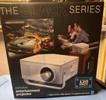 The Black Series Portable Entertainment Projector 16:9 White Desktop 1503048. Fixed Price $35.00.