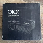 Qkk Mini Projector PJ0431. Fixed Price $40.00.